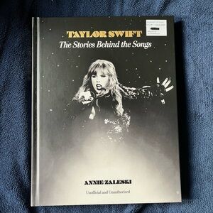 Taylor Swift: The Stories Behind the Songs. Hardcover book.